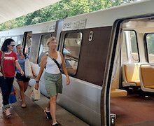 Passengers prepare to board a Blue Line train at the Van Dorn Street station in Alexandria, Virginia, on Aug. 28 as the eighth phase of Metro's SafeTrack maintenance project continues. Photo by William J. Ford