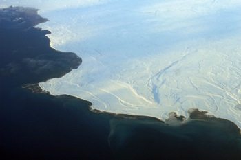 Sea ice, shown here in Nunavut, in northern Canada, reflects more sunshine, while open ocean absorbs more, accelerating melting. (Doc Searls via Wikipedia)