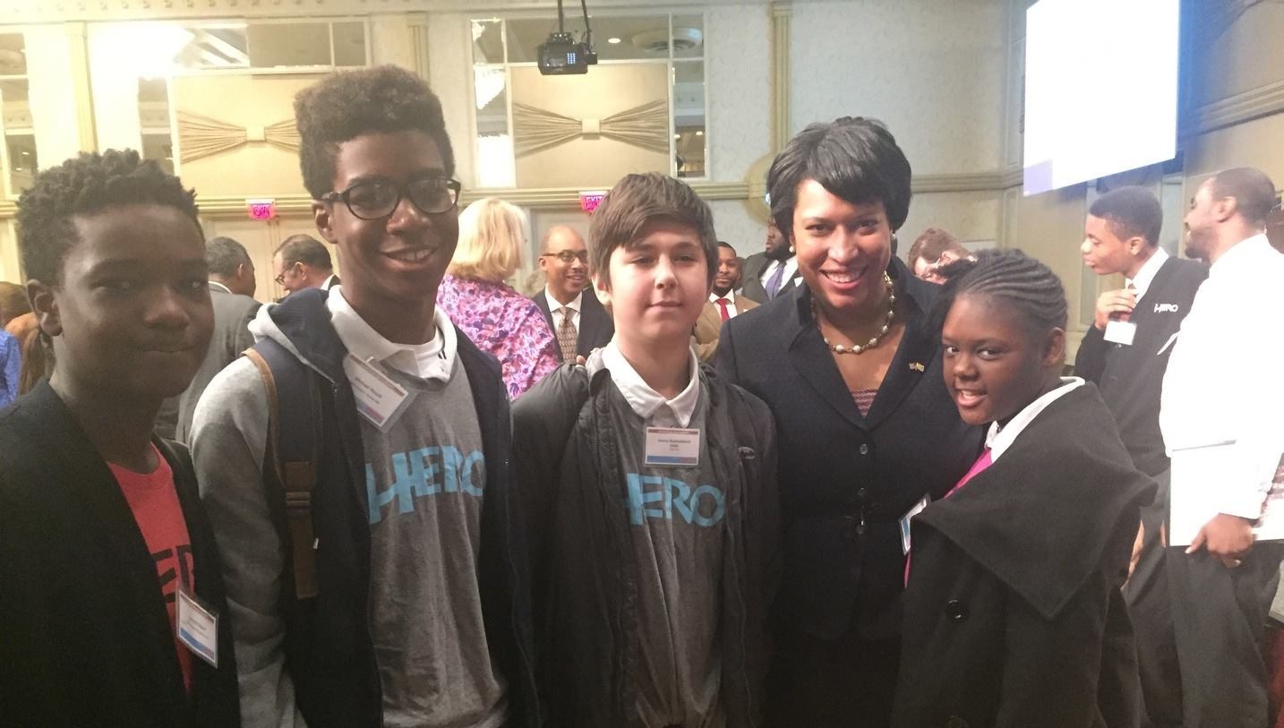 Keynote speaker Mayor Muriel Bowser poses with members of the College Success Foundation - DC, HERO program during the eighth annual CSF-DC Breakfast Fundraiser on Thursday, Oct. 22 at The Capital Hilton in Northwest. /Photo courtesy of CSF-DC.