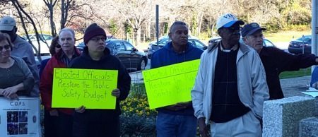 Prince George's County residents hold a rally in front of the County Administration building in Upper Marlboro on Nov. 16 in support of police officers. PHOTO BY WILLIAM J. FORD