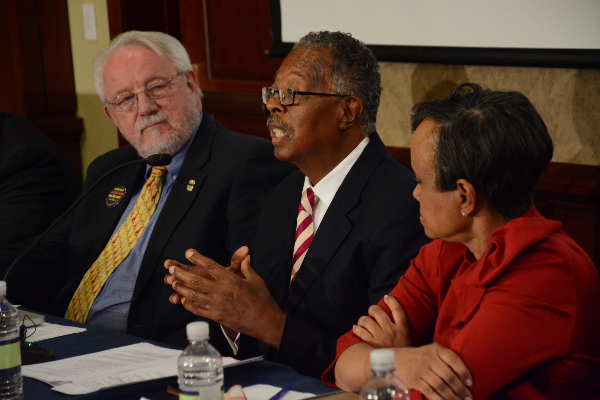 Dr. George W. Woods, Jr. speaks on the Gun Violence and Trauma Congressional Briefing panel held Monday, Nov. 1 in Northwest with Jack Cole (left), co-founder of Law Enforcement Against Prohibition, and Judge Glenda Hatchet. /Photo by Roy Lewis
