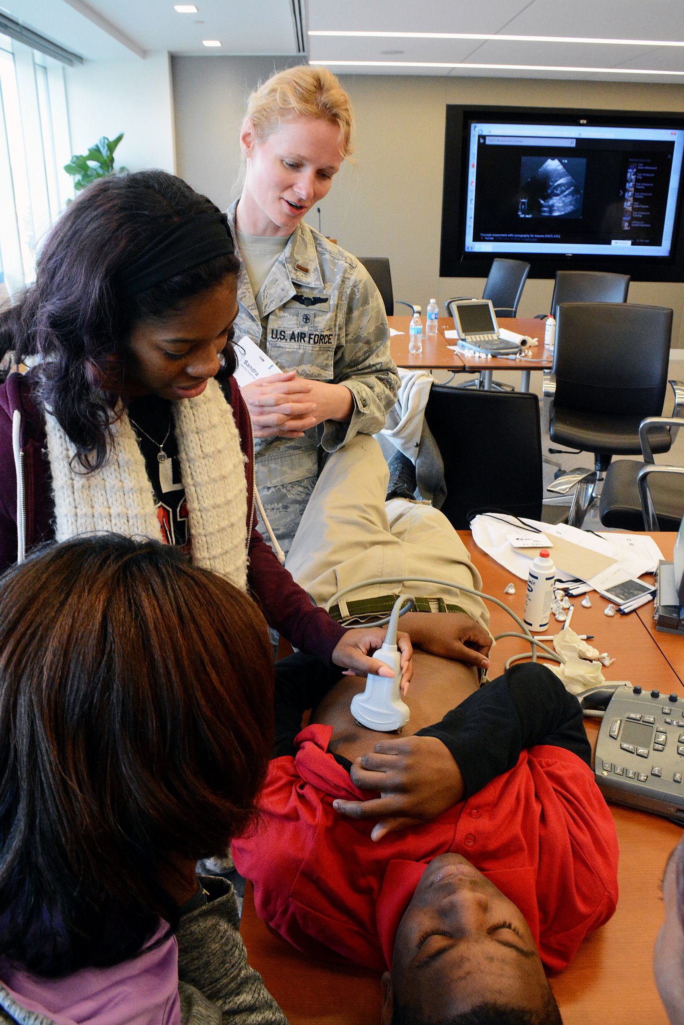 Howard University medical students demonstrate to D.C. high school students how to hear a heartbeat and check blood pressure during the Mentoring in Medicine event at the Association of American Medical Colleges in northwest D.C. on Dec. 19.