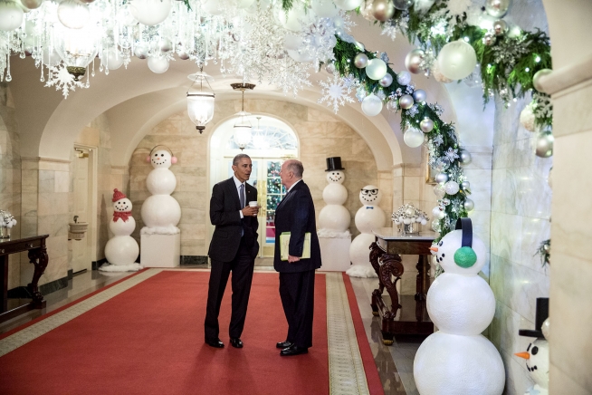 **FILE** President Barack Obama talks with Tom Donilon, chair of the President's Commission on Enhancing National Cybersecurity, in the Lower Cross Hall of the White House on Dec. 2, 2016. (Pete Souza/White House)