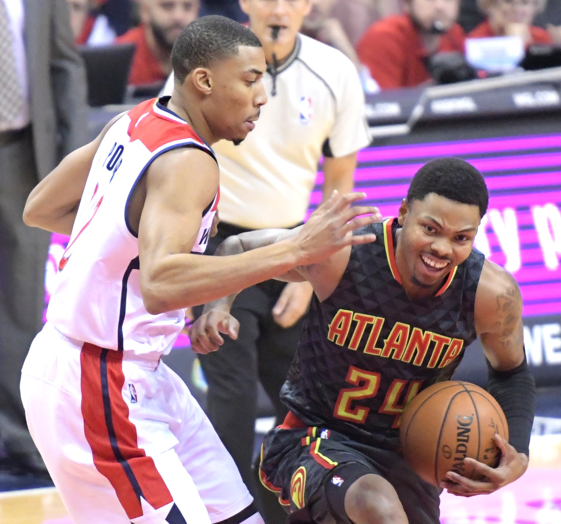 Atlanta Hawks small forward Kent Bazemore drives past Washington Wizards small forward Otto Porter Jr. during the Wizards' 95-92 win at Verizon Center in northwest D.C. on Friday, Nov. 4. /Photo by John E. De Freitas
