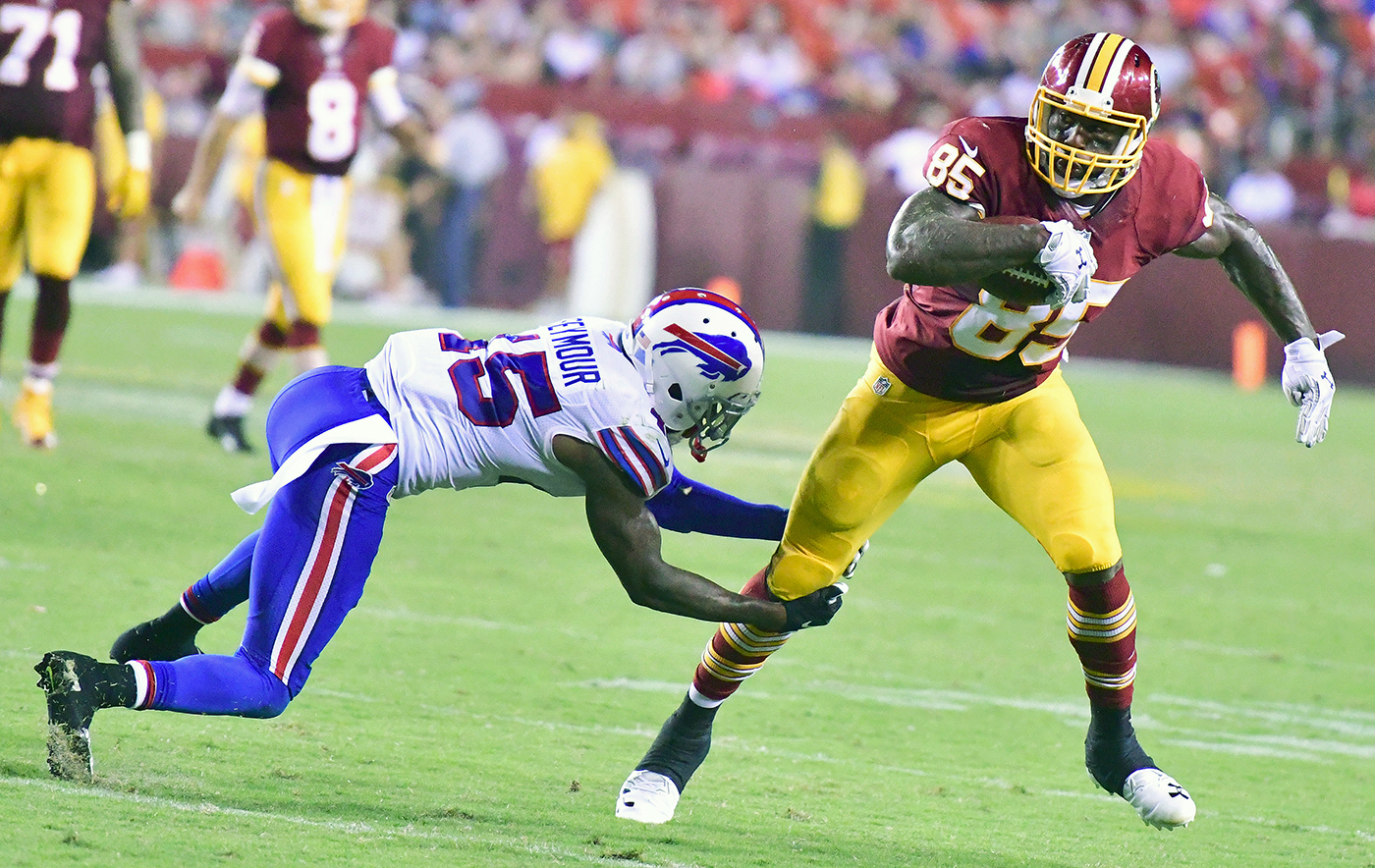 Buffalo Bills running back Jonathan Williams outruns Washington Redskins linebacker Willie Jefferson en route to a 37-yard touchdown in the third quarter of the Redskins' 21-16 preseason win at FedEx Field in Landover, Maryland, on Friday, Aug. 26. /Photo by John E. De Freitas