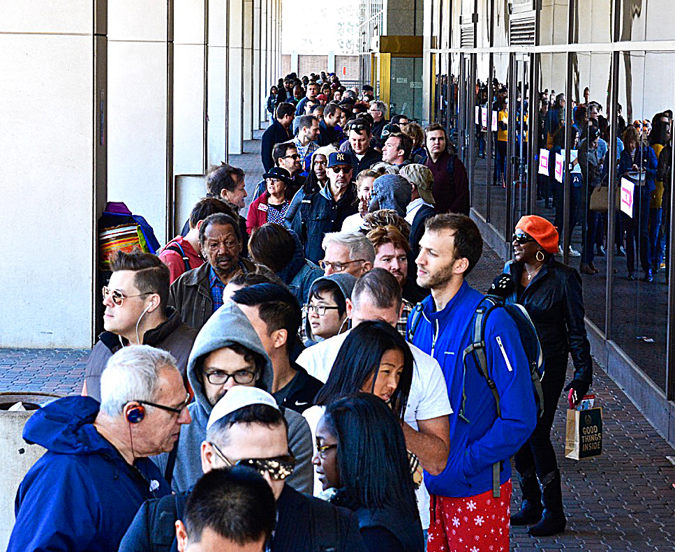 Hundreds of D.C. residents stand in line at the One Judiciary Square building in Northwest on Saturday, Oct. 22 as early voting gets underway in the city. The location is scheduled to operate from 8:30 a.m.-7 p.m. through Nov. 4. /Photo by Travis Riddick