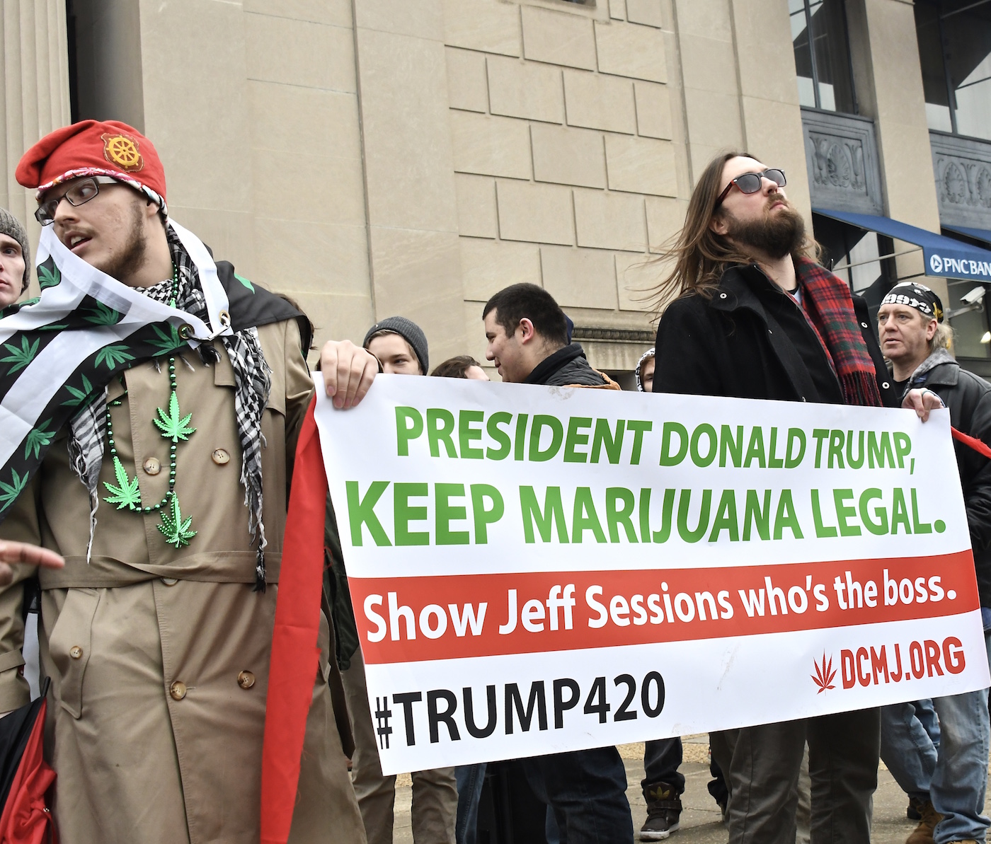 Hundreds of demonstrators rally at 20th Street and Massachusetts Ave in northwest D.C. in support of federally legalizing marijuana and in protest of Sen. Jeff Sessions, newly elected President Trump's pick of attorney general, on Jan 20. (Travis Riddick/The Washington Informer)