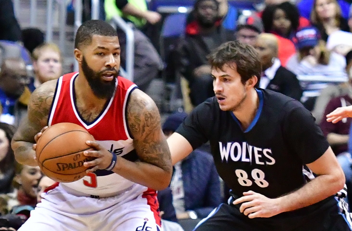 Washington Wizards forward Markieff Morris posts up against Minnesota Timberwolves forward Nemanja Bjelica in the first quarter of the Wizards' 112-105 victory at Verizon Center in northwest D.C. on Jan. 6. (John De Freitas/The Washington Informer)