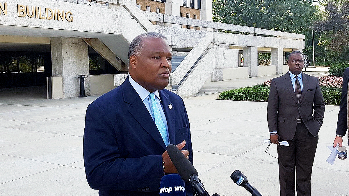Prince George's County Executive Rushern L. Baker III speaks to reporters outside the county administration building on Oct. 12 regarding public schools CEO Kevin Maxwell, who is under siege from the NAACP amid several recent scandals. /Photo by William J. Ford