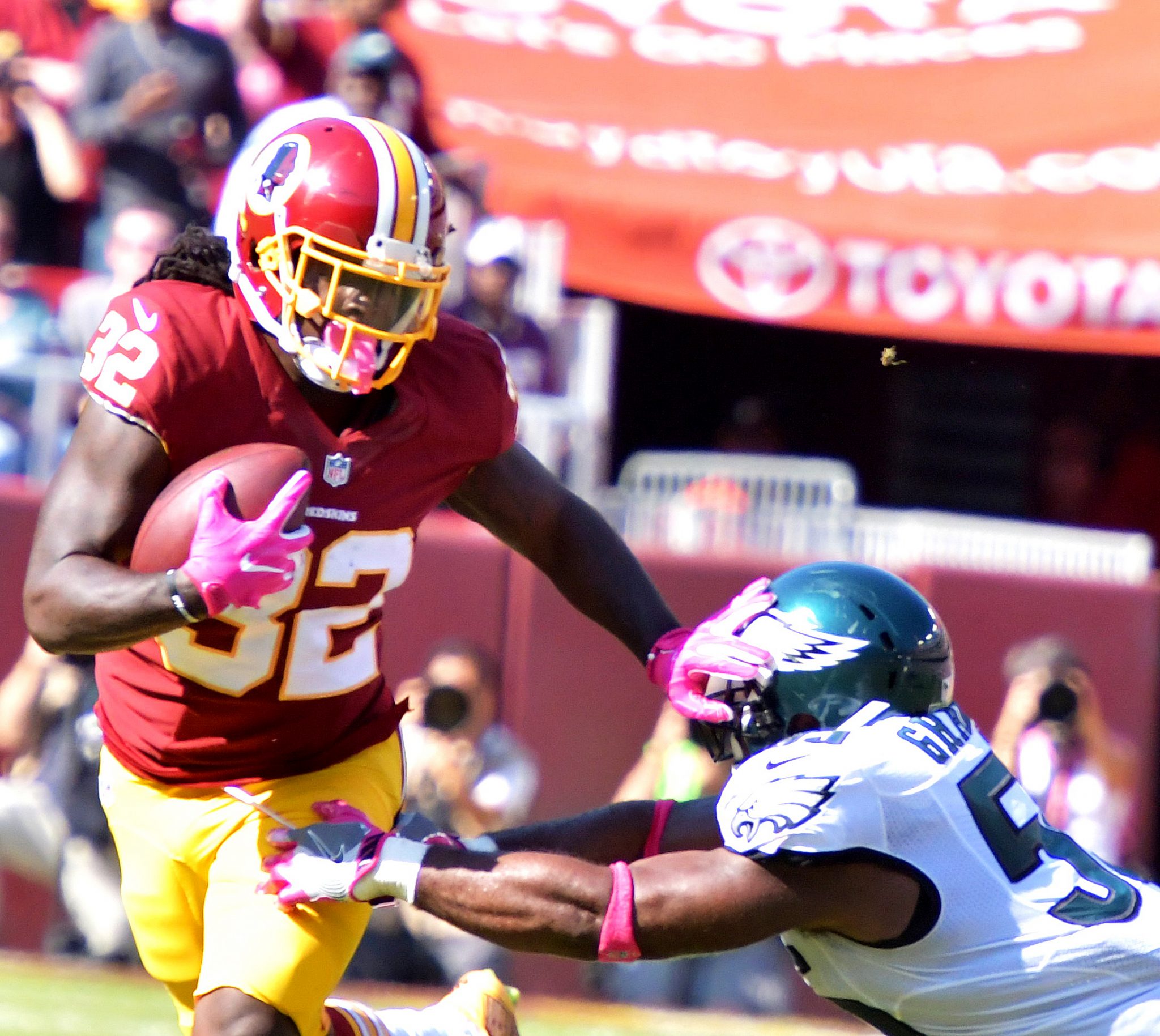 Washington Redskins running back Robert Kelley sloughs off Philadelphia Eagles defensive end Brandon Graham during the Redskins' 27-20 win at FedEx Field in Landover, Maryland, on Sunday, Oct. 16. /Photo by John E. De Freitas
