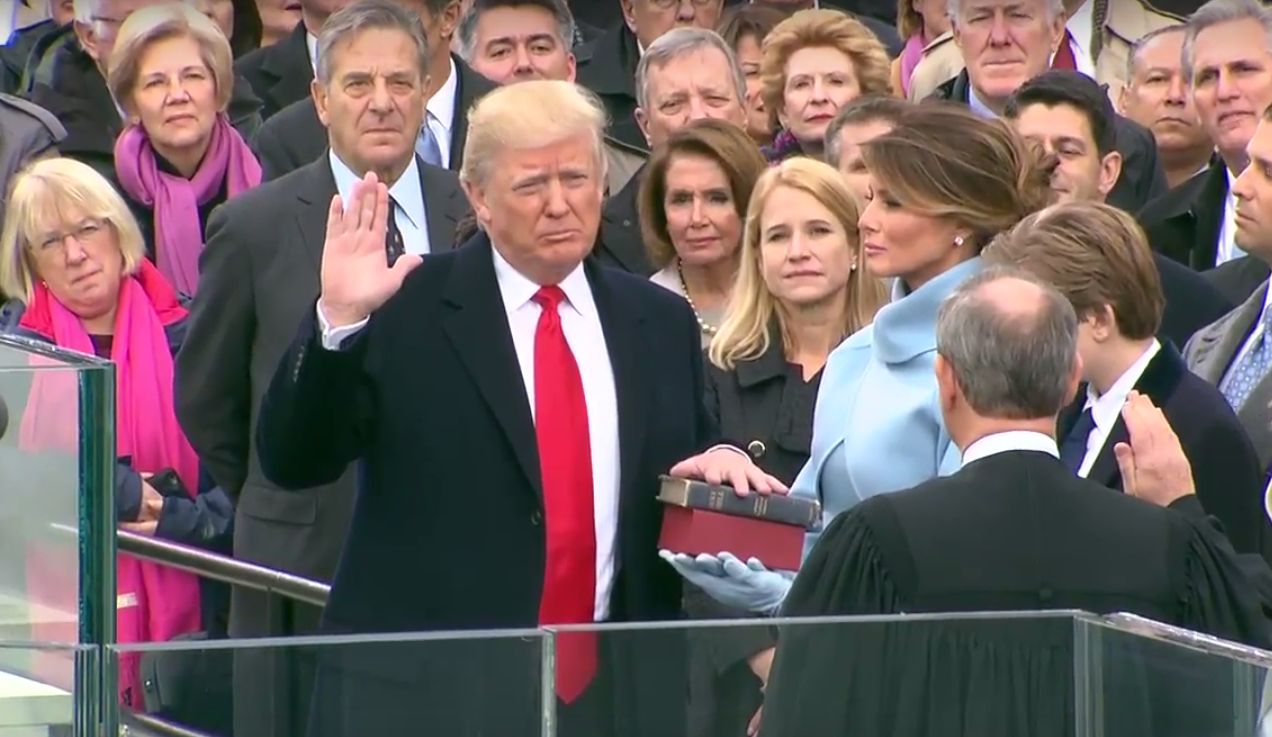 Donald Trump takes the oath of office as the 45th president of the United States at the U.S. Capitol on Jan. 20. /Photo by Shevry Lassiter