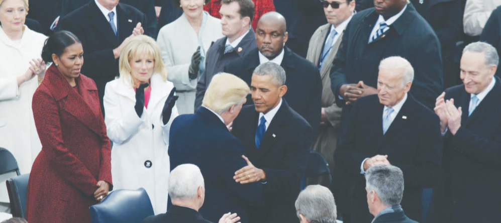 The 44th President Barack Obama and the 45th President Donald Trump greet each other at the 58th Presidential Inauguration on Friday, Jan. 20 at the U.S. Capitol. (Roy Lewis/The Washington Informer)