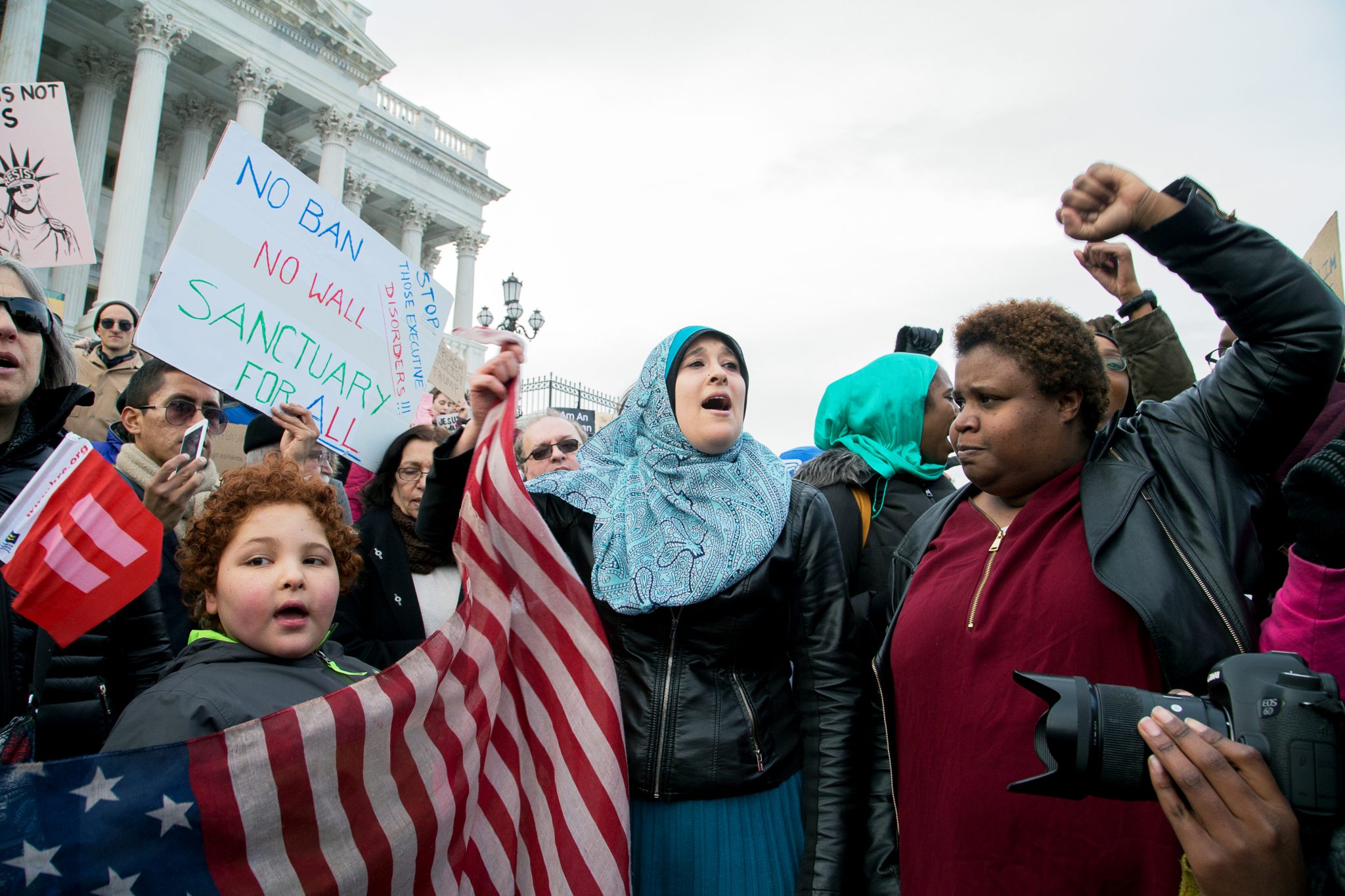 Hundreds of protesters demonstrate in northwest D.C. between the White House and Capitol against President Trump's Muslim immigration ban on Jan. 29, 2017. (Mark Mahoney/The Washington Informer)