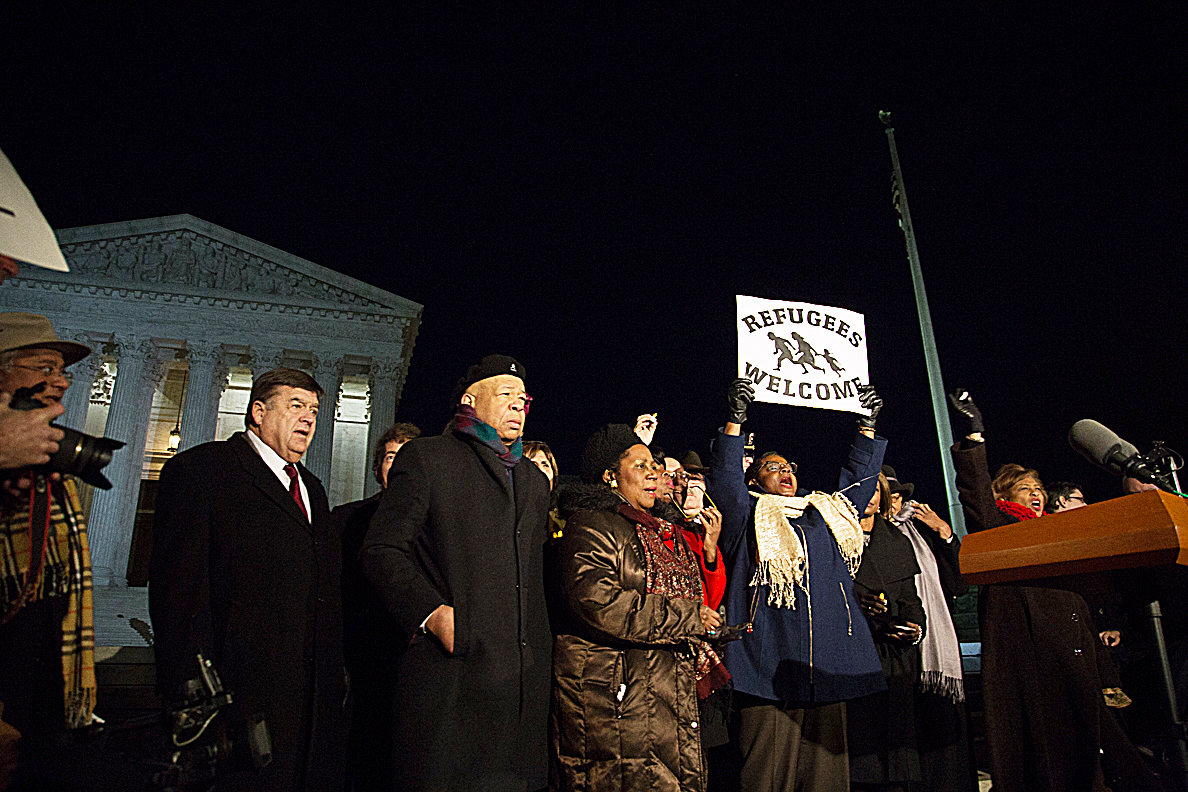 Members of the House and Senate rally at the Supreme Court against President Trump's immigration ban on Monday, Jan. 30.