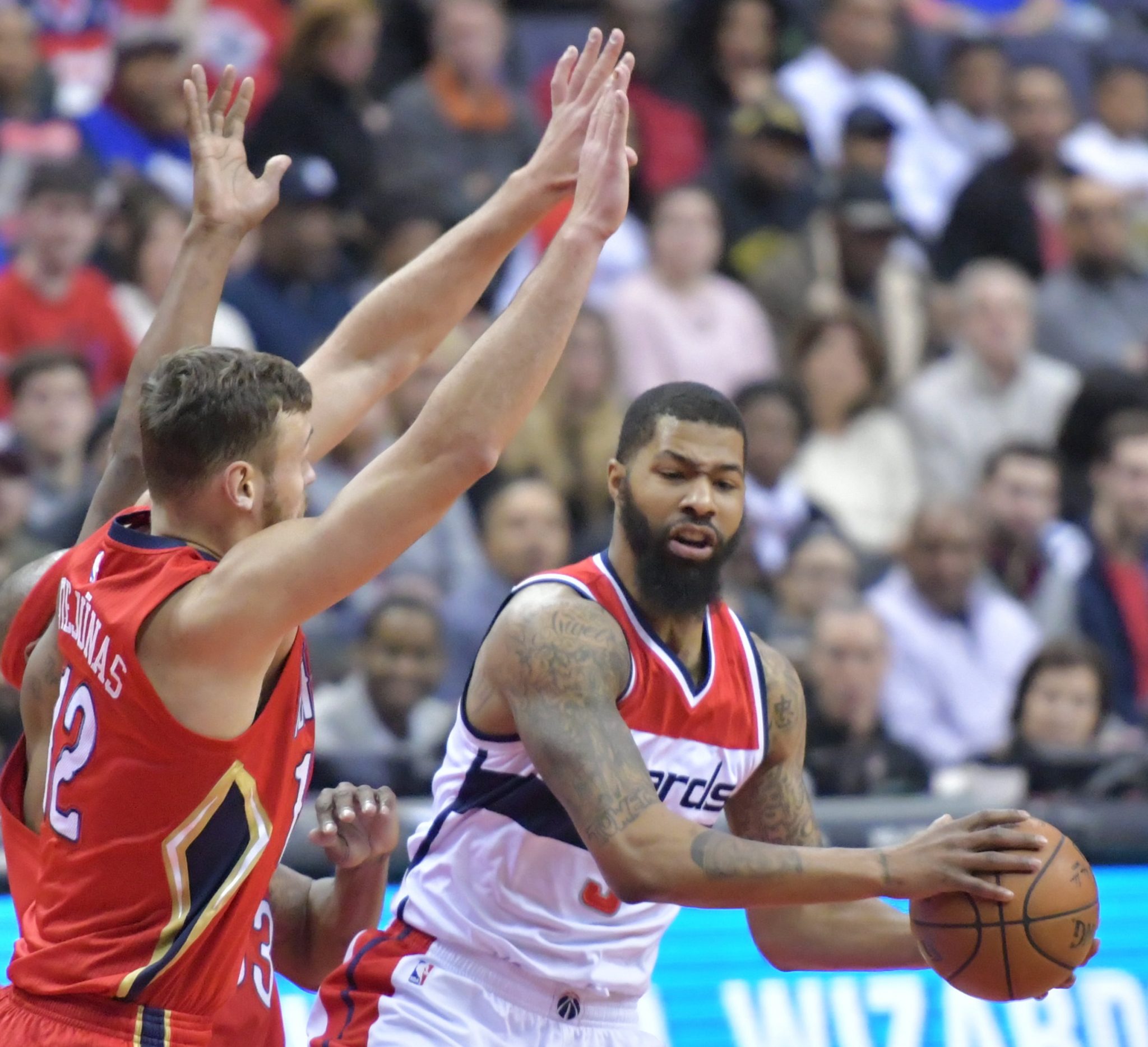 Washington Wizards forward Markieff Morris looks to pass in the second quarter of the Wizards' 105-91 win against the New Orleans Pelicans at Verizon Center in northwest D.C. on Feb. 4. (John De Freitas/The Washington Informer)