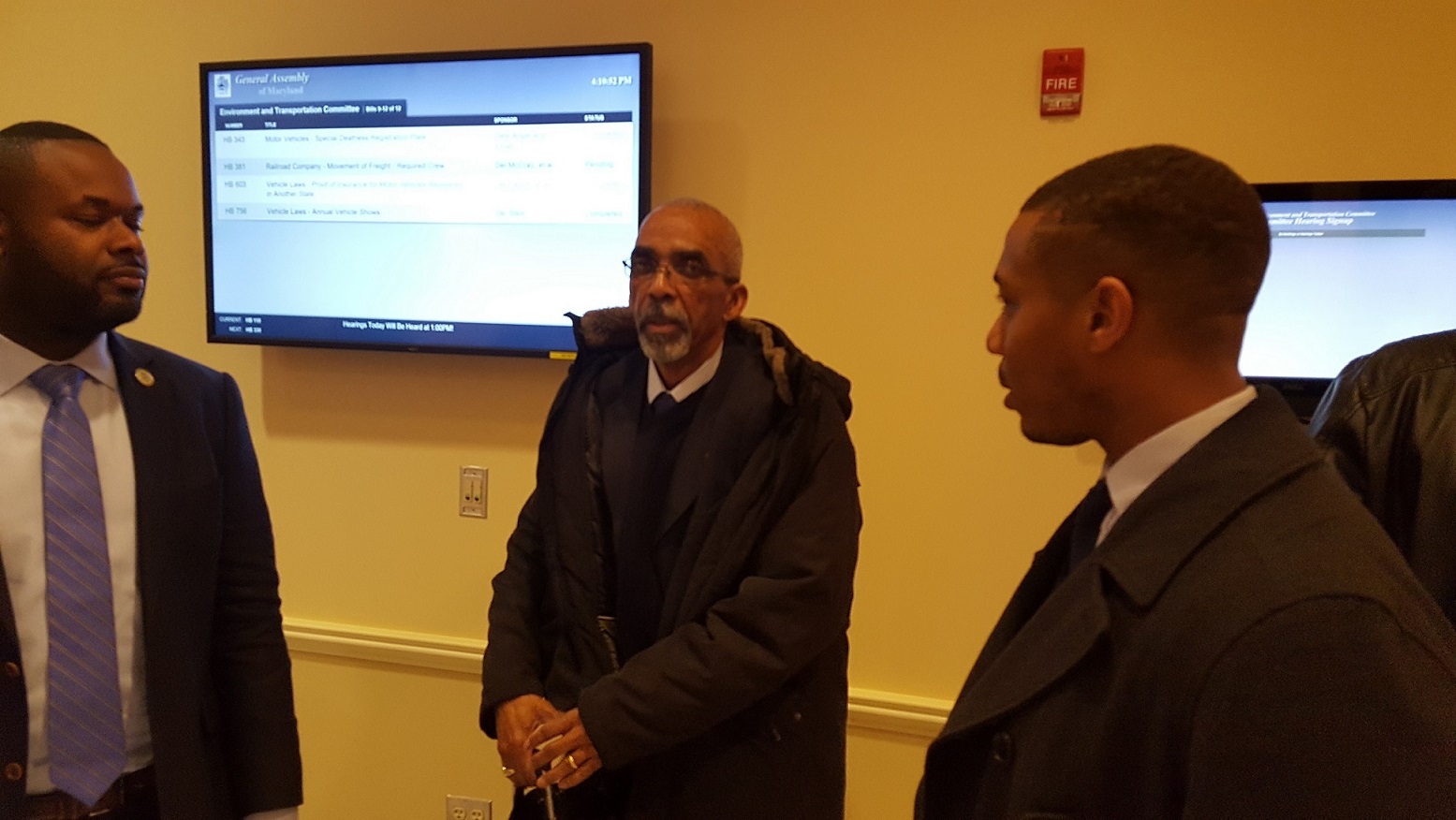 Roland Jeter (center), former first vice president of Amalgamated Transit Union Local 689, chats with Local 689 spokesman David Stephen (right) and Maryland Delegate Cory V. McCray of Baltimore City after Feb. 16 hearing in Annapolis before the state House's Environmental and Transportation Committee on creating a Metrorail safety commission. (William J. Ford/The Washington Informer)