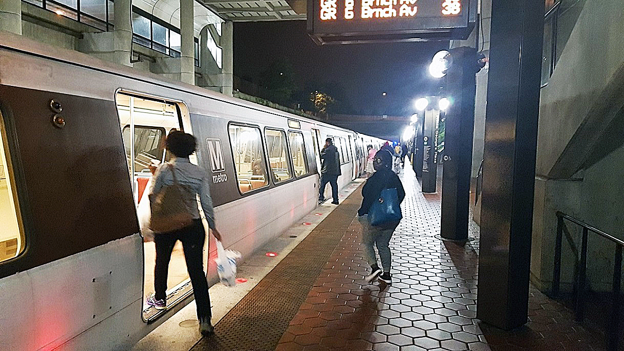 Passengers board a Green Line train at the Prince George's Plaza Metro station in Hyattsville in September. Metro recently released a safety report that shows injuries among riders and employees slightly increased last year. (William J. Ford/The Washington Informer)