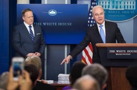 Health and Human Services Secretary Tom Price points out a side-by-side comparison of the Affordable Care Act and the much-smaller GOP replacement proposal during a March 7 press briefing as White House Press Secretary Sean Spicer looks on.