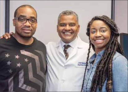 Dr. J. Keith Melancon has turned a recently established kidney transplant center at the District’s George Washington University Hospital into one of the country’s most-respected and successful facilities, quickly emerging as a beacon of hope for Blacks and other minorities living in the Greater Washington Area. Pictured are: (left to right) Reginald Carroll, who donated a kidney to his wife (Alana), Dr. Melancon and his patient and kidney recipient, Alana Hunnicutt-Carroll. (Courtesy of George Washington University Hospital)