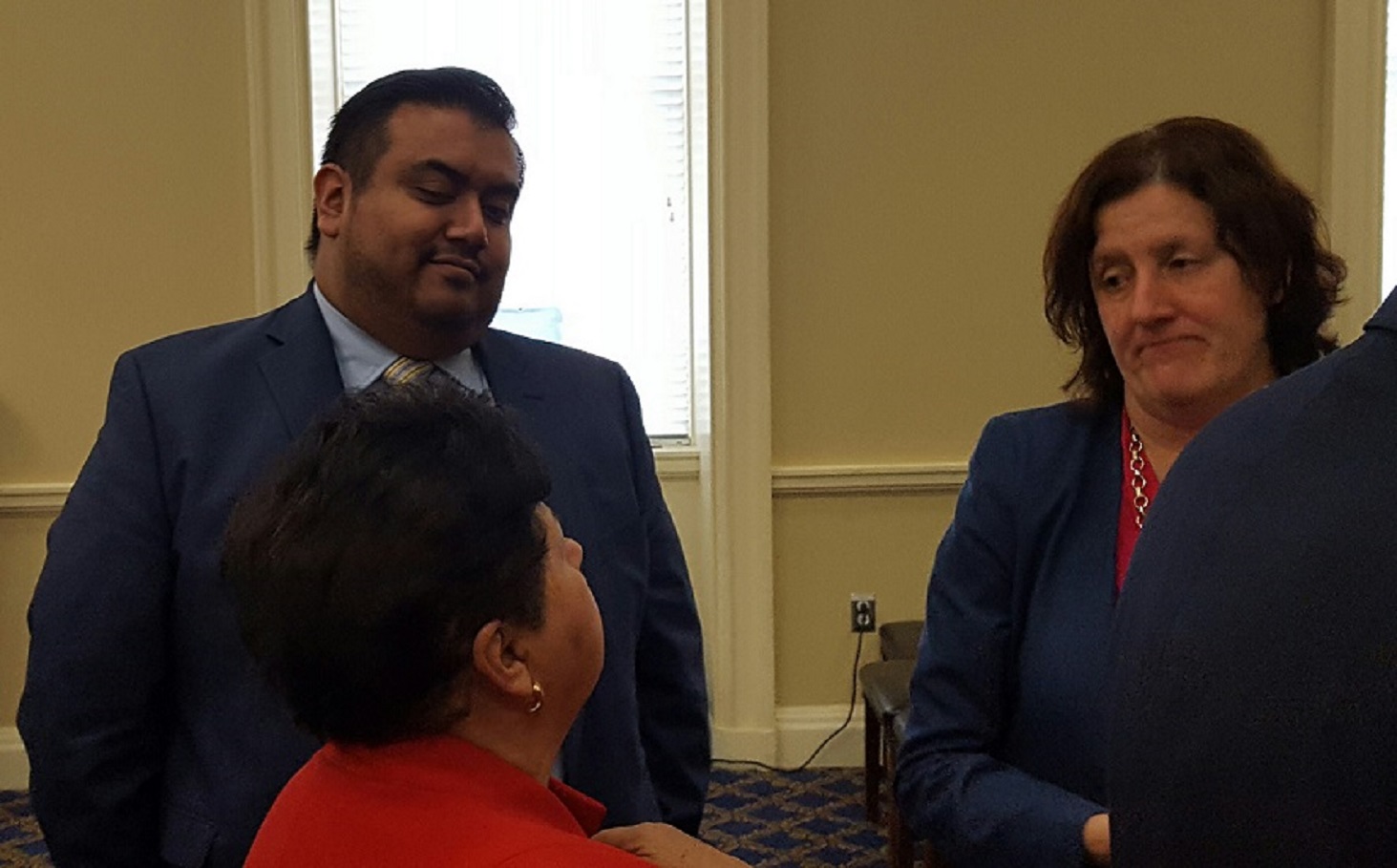 Maryland Del. Carlo Sanchez (center) participates in an April 3 press conference in Annapolis to advocate for legislation combating racial profiling against immigrants. (William J. Ford/The Washington Informer)