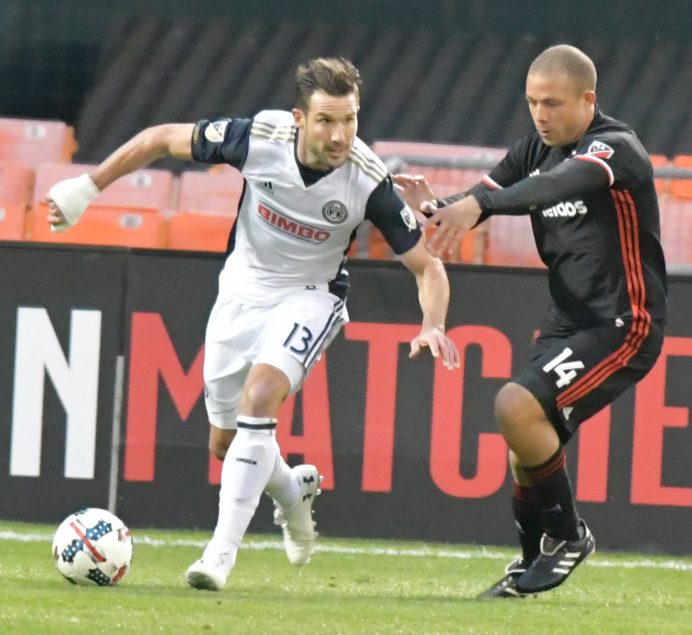 Philadelphia Union midfielder and former D.C. United starter takes on D.C. United defender Nick DeLeon during D.C. United 2-1 win at RFK Stadium in Southeast on Saturday, Apr. 1./Photo by John E. De Freitas