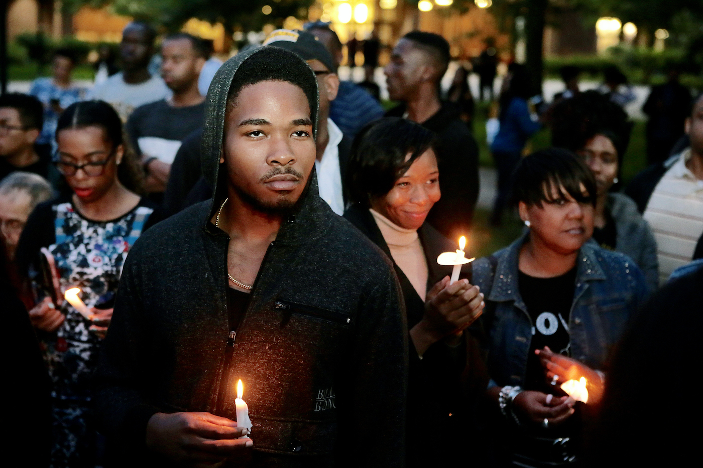 Hundreds of students, alumni and other supporters attend a candlelight vigil May 22 to honor Richard Collins III, who would have graduated from the school May 23. (Demetrious Kinney/The Washington Informer)