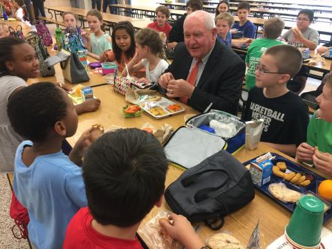 Secretary of Agriculture Sonny Perdue eats lunch with students at Catoctin Elementary School in Leesburg, Va. (Courtesy of USDA)