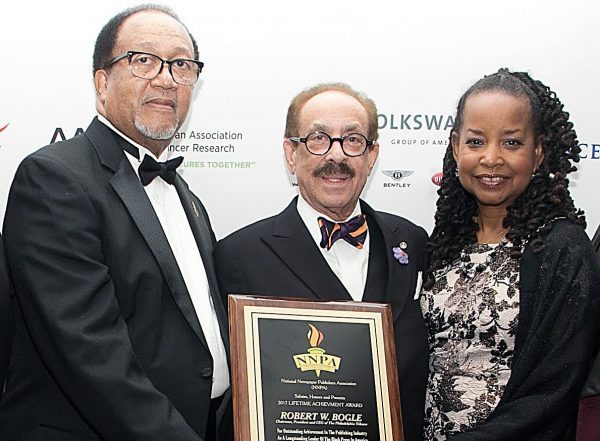 From left: Benjamin Chavis, NNPA president and CEO, pays tribute to Robert Bogle, president and CEO of the Philadelphia Tribune, the nation’s oldest Black-owned newspaper, along with Denise Rolark Barnes, Washington Informer publisher and NNPA chairperson, during a recent NNPA convention. (Shevry Lassiter/The Washington Informer)