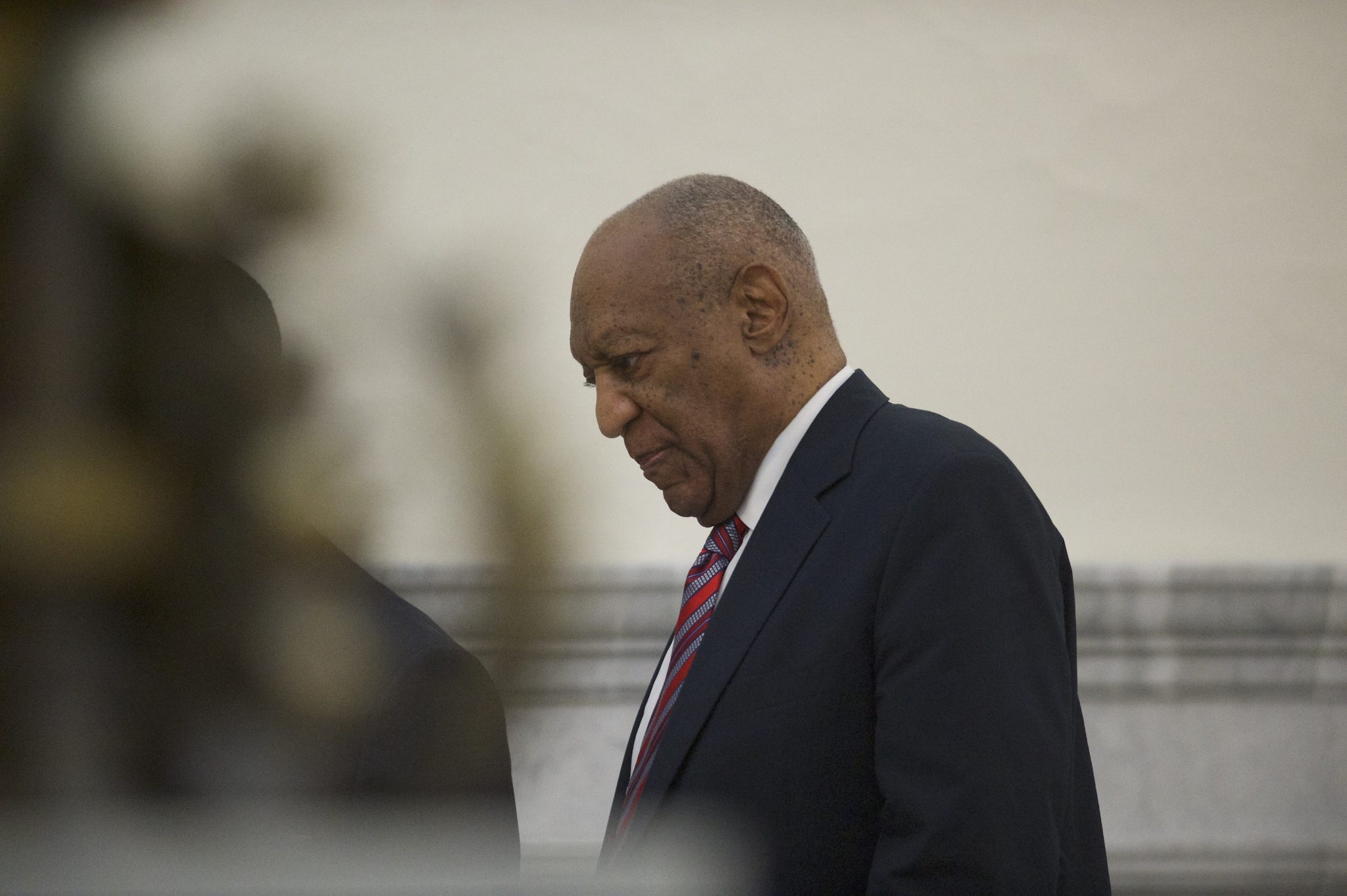 Bill Cosby walks through the Montgomery County Courthouse on the third day of his sexual assault trial in Norristown, Pennsylvania, on June 7, 2017. (Mark Makela/Getty Images, Pool)