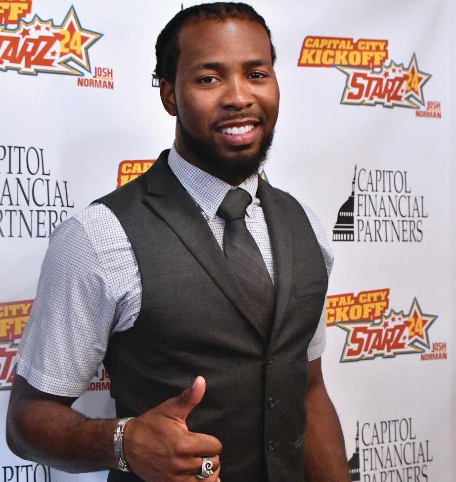 Washington Redskins cornerback Josh Norman smiles for the camera during a June 13 charity event for his Starz24 foundation at Hawthorne on U Street in Northwest. (Travis Riddick/The Washington Informer)