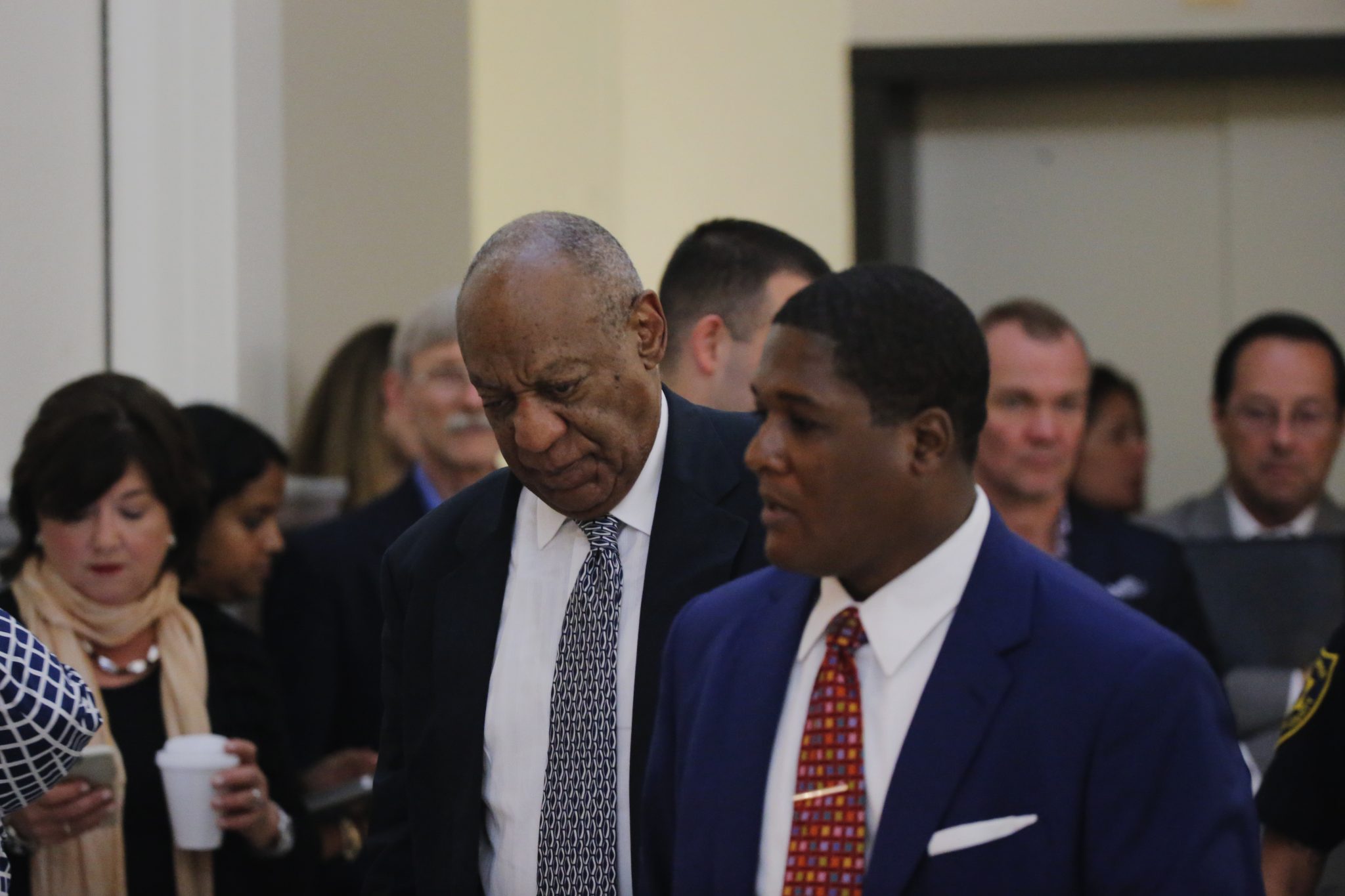 Actor and comedian Bill Cosby (center) walks to the courtroom during the fifth day of deliberations in Bill Cosby's sexual assault trial at the Montgomery County Courthouse in Norristown, Pennsylvania, on June 16, 2017. (Lucas Jackson/Reuters, Pool)