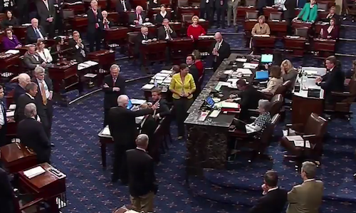 Sen. John McCain votes against the Senate bill to repeal the Affordable Care Act on July 28.
