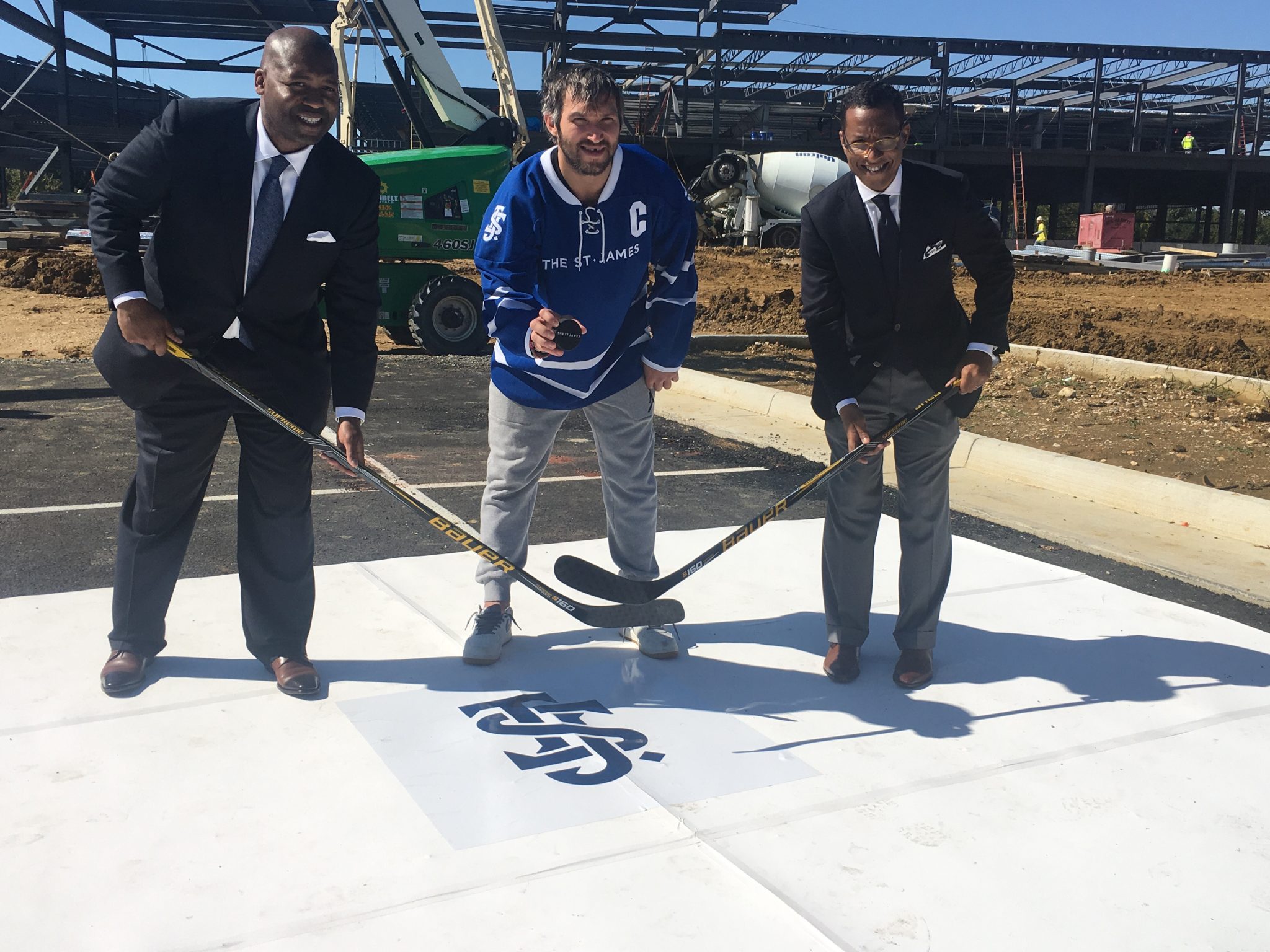 Kendrick Ashton and Craig Dixon of the St. James Group and Washington Capitals star Alexander Ovechkin break ground on Sept. 7 for the St. James Complex in Springfield, Virginia, scheduled to open September 2018.