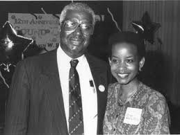 A much younger Denise Rolark Barnes with her father, Dr. Calvin Rolark Sr. (WI photo)