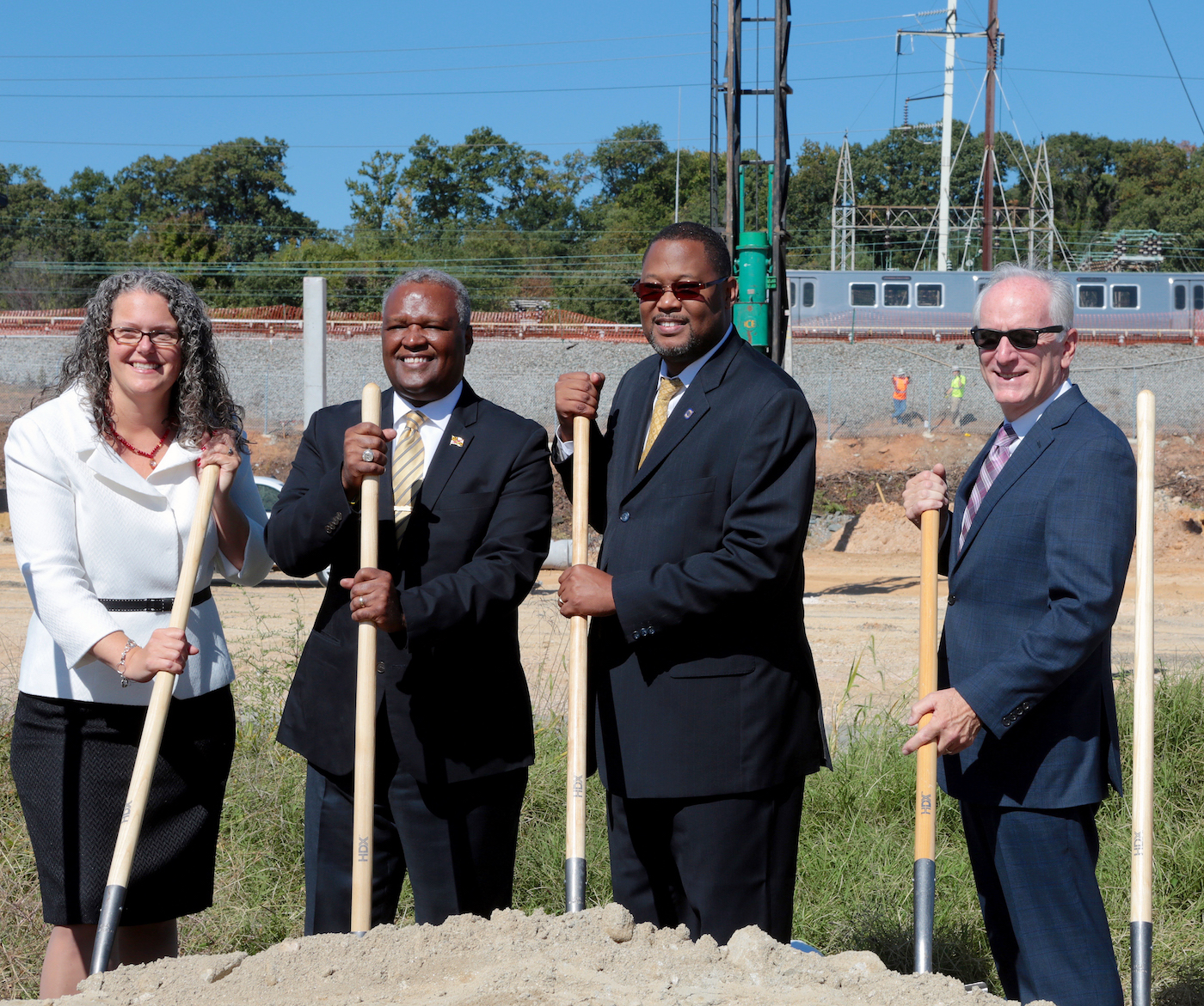 Officials pose after groundbreaking ceremony Oct. 4 to open a Kaiser Permanente building in New Carrollton, Maryland. (Demetrius Kinney/The Washington Informer)