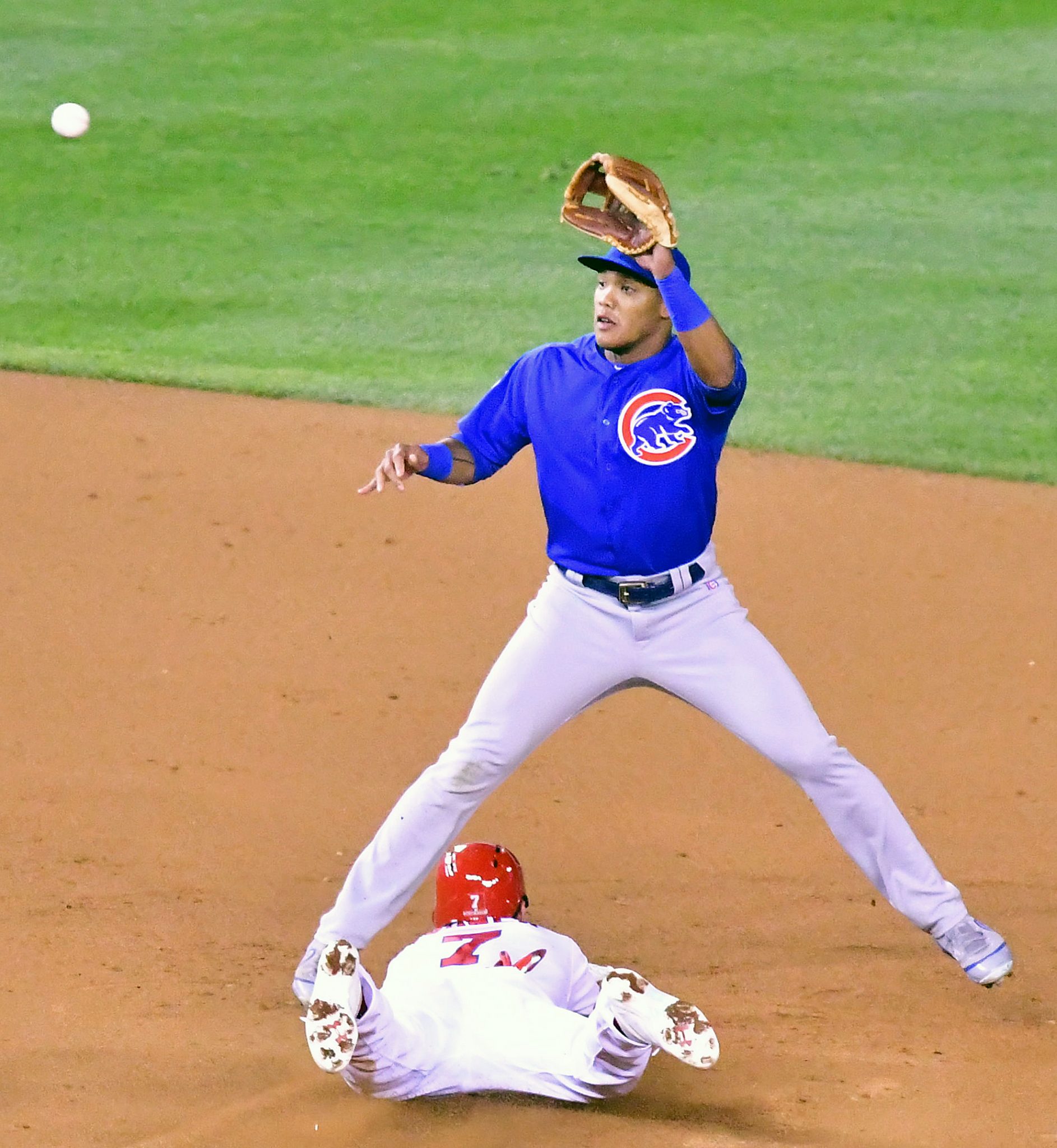 Chicago Cubs second baseman Javier Baez awaits the throw as Washington Nationals shortstop Trea Turner steals second base during the Cubs' 9-8 win in Game 5 of the National League Division Series at Nationals Park in Southeast on Oct. 12. (John E. De Freitas/The Washington Informer)