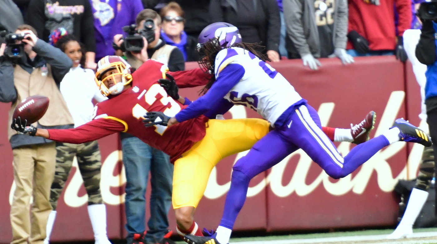 Washington Redskins wide receiver Maurice Harris lays out to haul in a one-handed touchdown while defended by Minnesota Vikings cornerback Trae Waynes in the first quarter of the Vikings' 38-30 win at FedEx Field in Landover, Md., on Nov. 12. (John E. De Freitas/The Washington Informer)