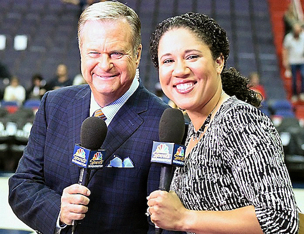 Kara Lawson (right), seen here with longtime broadcaster Steve Buckhantz before a recent Washington Wizards game, replaced Phil Chenier, who worked as analyst for 33 years. (John De Freitas/The Washington Informer)
