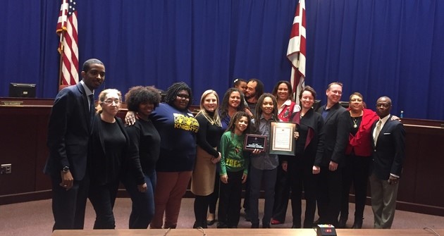 The D.C. State Board of Education honors student-athlete Changa Anderson (center), grandson of former board representative D. Kamili Anderson. (Courtesy of DC SBOE)
