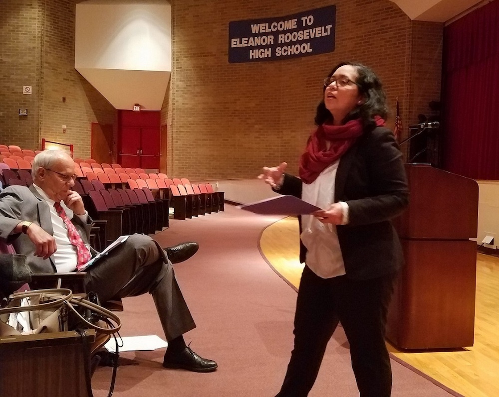 Prince George's County School board member Lupi Quinteros-Grady speaks during a Jan. 11 meeting in Greenbelt at which state Sen. Paul Pinsky (left) gave updates on recommendations to a statewide plan for school funding. (William J. Ford/The Washington Informer)