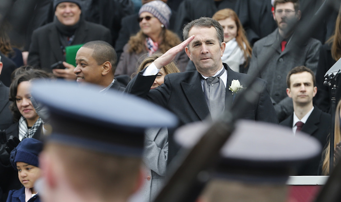Virginia Gov. Ralph Northam, alongside Lt. Gov. Justin Fairfax (left), salutes Virginia Military Corp Cadets during his inauguration at the State Capitol in Richmond on Jan. 13. (Courtesy of virginiademocrats.com)