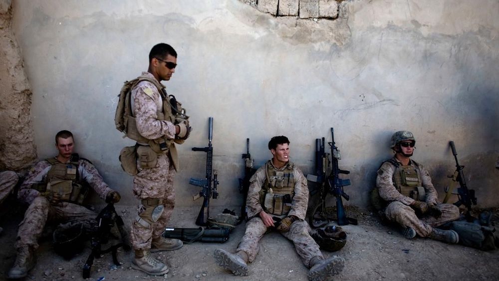 Soldiers rest from the battle. (Courtesy of Fox News)