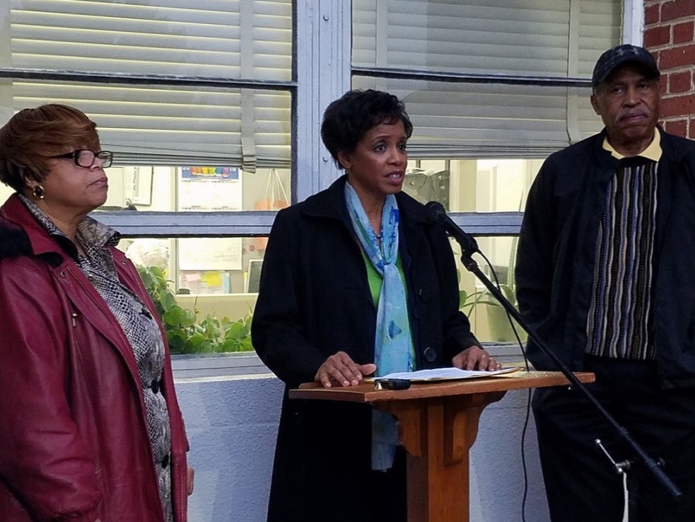 Donna Edwards, candidate for Prince George's County executive, speaks during a Feb. 22 press conference outside the school administration building in Upper Marlboro as Phyllis Wright (left), parent of two county students, and Bob Ross, president of the county's NAACP chapter, look on. (William J. Ford/The Washington Informer)