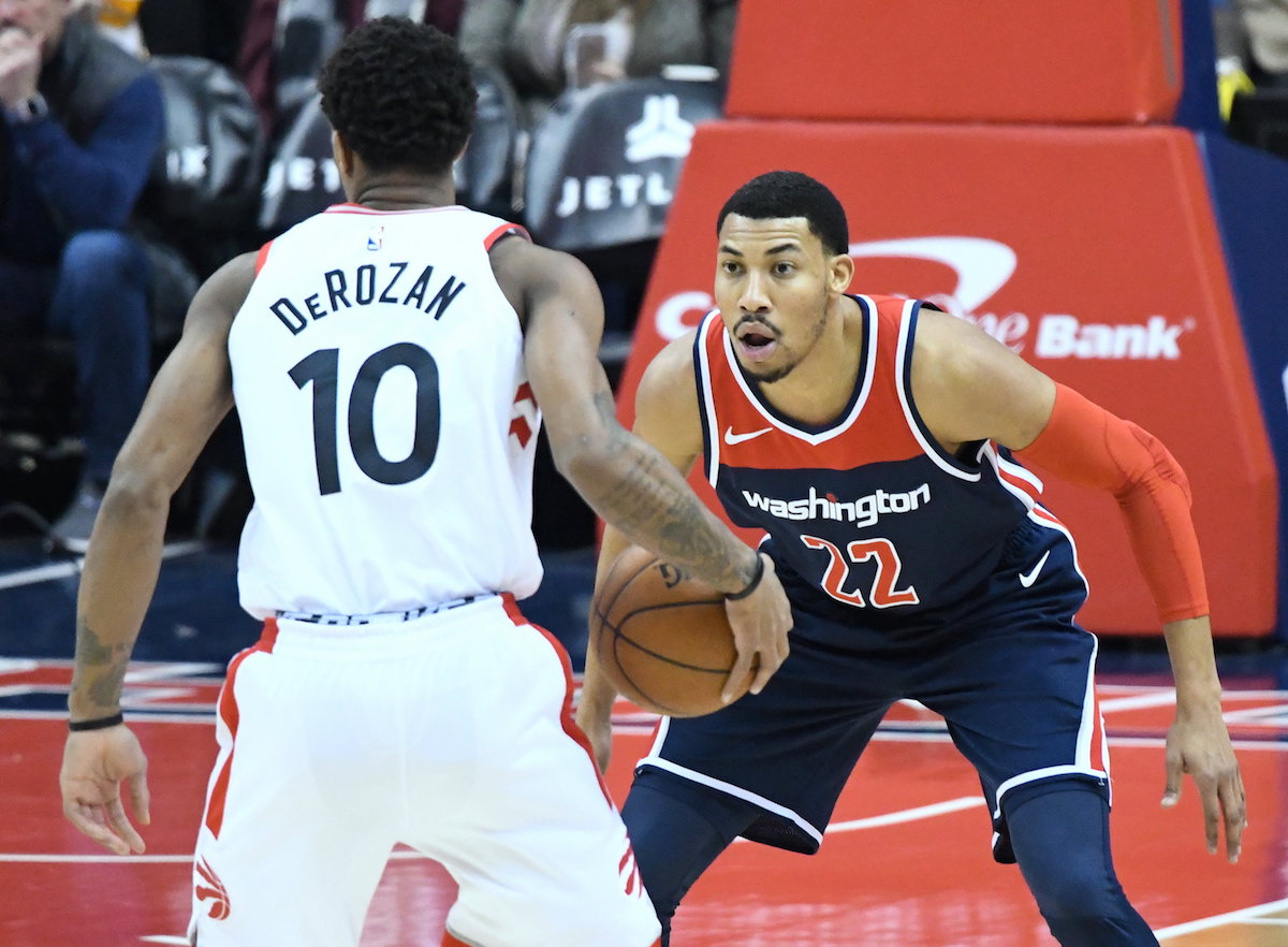 Washington Wizards forward Otto Porter Jr. defends Toronto Raptors guard DeMar DeRozan during Wizards' 122-119 win at Capital One Arena in D.C. on Feb. 1. (John De Freitas/The Washington Informer)
