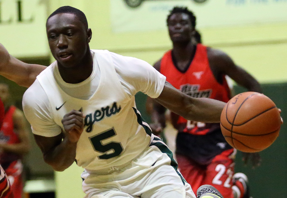 Woodrow Wilson High School junior guard Jay Heath Jr. is averaging over 13 points per game and has helped lead his team to a record of 21-7. (Daniel Kucin Jr./The Washington Informer)
