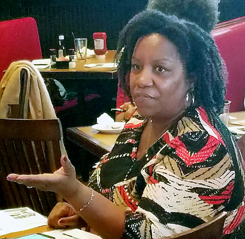 Robin Williams, a former D.C. elementary teacher and instructional coach, speaks at a parent engagement meeting at TGI Fridays in Forestville, Maryland, on Feb. 17. (William J. Ford/The Washington Informer)