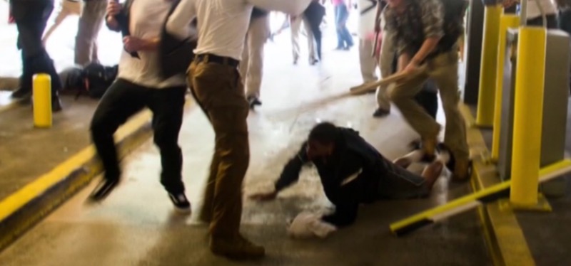 DeAndre Harris is beaten by participants in a White supremacists' rally in Charlottesville, Virginia, on Aug. 12. (Screen shot courtesy of CNN)