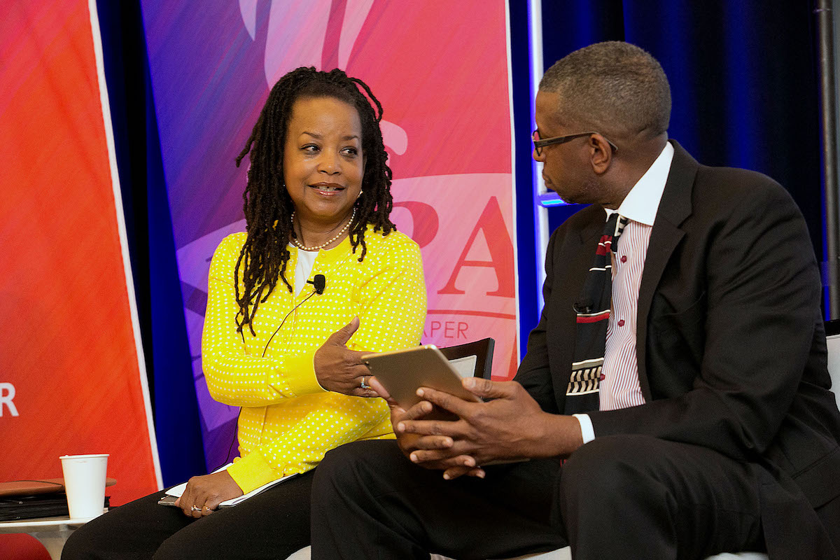 Washington Informer Publisher Denise Rolark Barnes discusses educational outcomes for D.C. public school students as DNA Educational Solutions and Support CEO Dr. Robert L. Kirton Jr. looks on during a breakfast session hosted by the NNPA ESSA Public Awareness Campaign, for Black Press Week in D.C. (Mark Mahoney/NNPA)