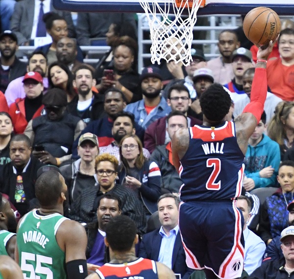 Washington Wizards guard John Wall drives for a layup attempt during a 113-101 win over the Boston Celtics at Capital One Arena in D.C. on April 10. (John De Frietas/The Washington Informer)