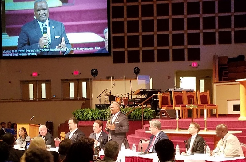 Maryland gubernatorial candidates (from left) Krish Vignarajah, Jim Shea, Ben Jealous, Kevin Kamenetz, Rushern L. Baker III, Richard Madaleno, Alec Ross and James Jones II participate in an April 25 candidates' forum at Reid Temple AME Church in Glenn Dale. (William J. Ford/The Washington Informer)